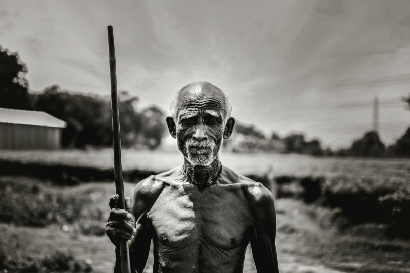 lifestyles, standing, focus on foreground, field, shirtless, one person, 5K, land, mature men, poor man, males, front view, indian people, muscular build