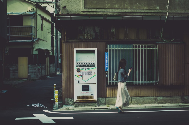 one person, adult, street, standing, transportation, footpath, Japan, building, full length, vending, road, city, women, building exterior, Japanese, communication