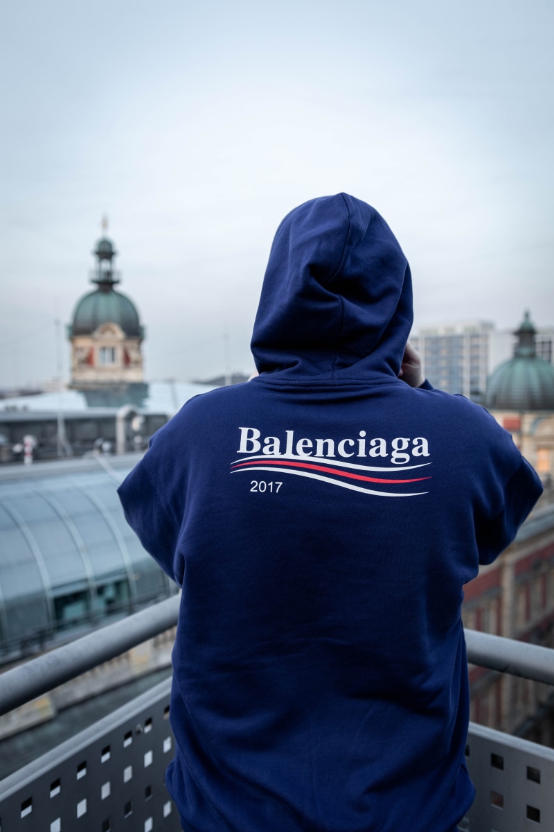 clothing, 2017, person, fashion, balenciaga2017, one person, waist up, hood, real people, day, rear view, 5K, white, uniform, human, building exterior