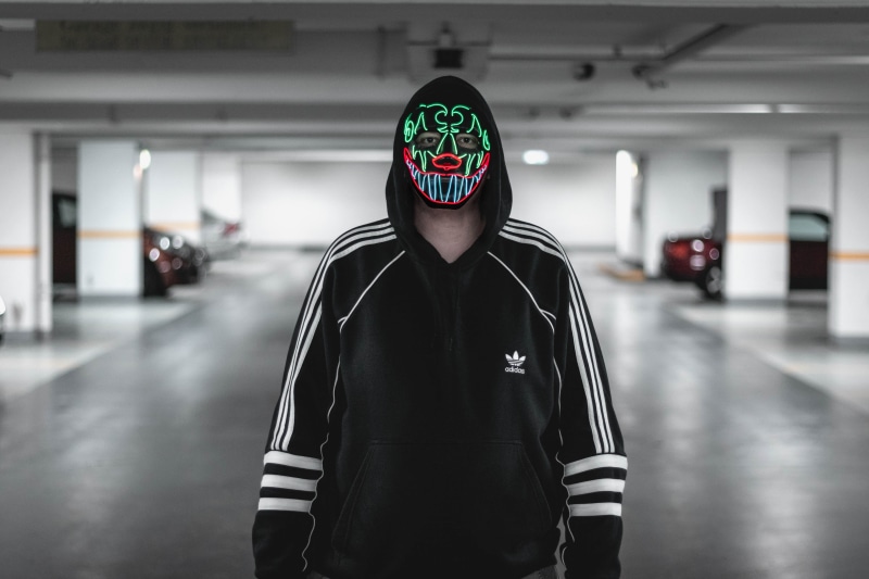 neon, sweater, lifestyles, leisure activity, apparel, portrait, wearing, unrecognizable person, focus on foreground, hood, hood - clothing, boy, adidas