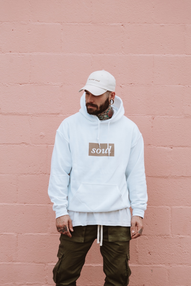 streetwear, pullover, clothe, lifestyles, wall, portrait, real people, portraiture, color, fashion, wearing, wall - building feature, clothing, young men