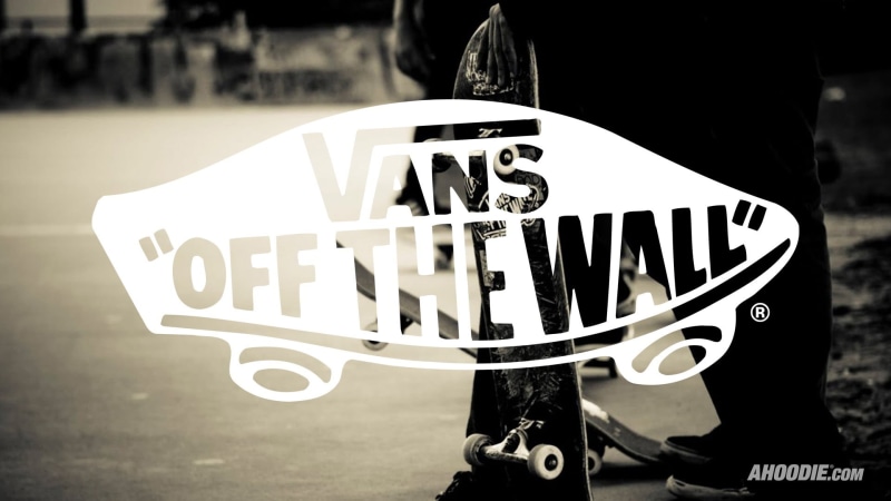 close-up, text, logo, outdoors, skateboarding, 1080P, day, wall, sign, vans, road, city, real people, capital letter, one person, focus on foreground