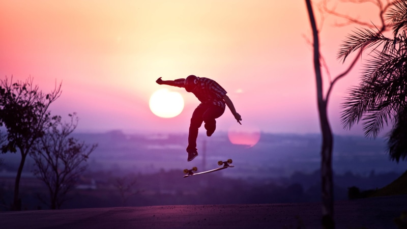 sunrise - Dawn, flying, skateboard, activity, mid-air, back Lit, lens flare, sky, fun, full length, stunts, one Person, sunlight, tree, plant, 2K, adventure