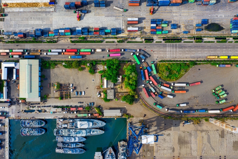 residential district, ship, container, sea, apartment, boats, customs, car, 5K, no people, architecture, seashore, vehicles, aerial view, building, colorful