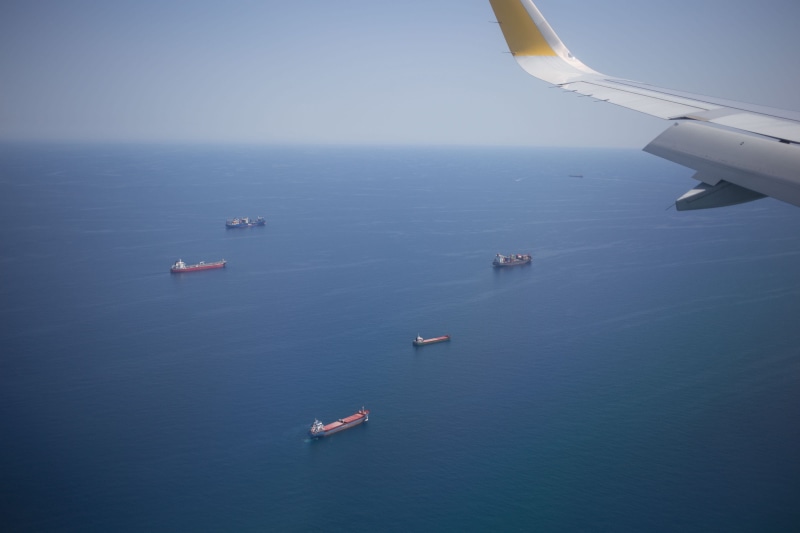 ship, background, waterfront, aerial, trade, no people, flying, aircraft, nature, beauty in nature, travel, fame, air vehicle, skyline, vessel, journey