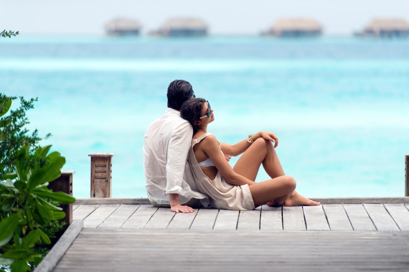 vacations, holiday, outdoors, beauty in nature, lifestyles, sitting, day, sea, water, leisure activity, 4K, summer, real people, adult, people, full length