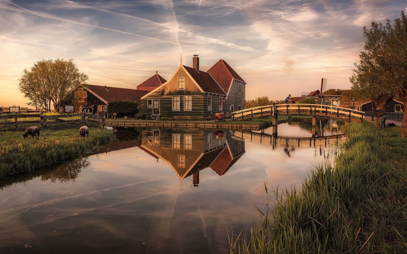 Zaanse Schans, no people, grass, wooden, near, water, built structure, reflection, windmill, building, tree, trees, fence, building exterior, belief, sunset