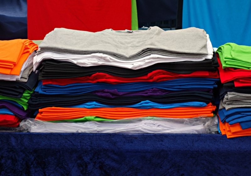 business, laundry, choice, backgrounds, no people, stall, heap, red, unisex, man, top, shirt, order, variation, textile, vibrant color, indoors, woman