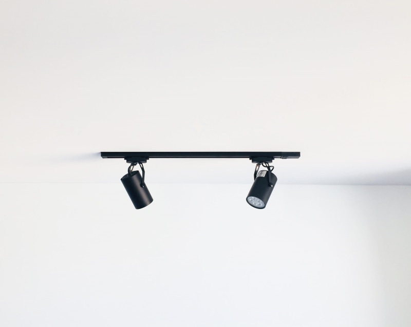 pair, day, security, lighting, indoors, two, no people, track projector, minimal, vanity, technology, surveillance, sign, track, lamp, background, safety