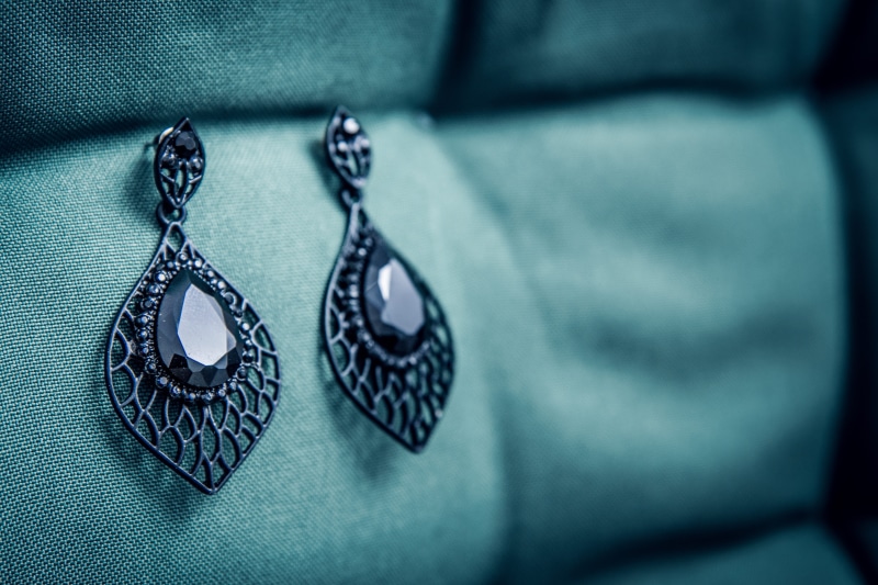 gold, precious stone, precious stones, indoors, diamond, necklace, jewelry, art and craft, jewels, silver, textile, selective focus, accessories, earring