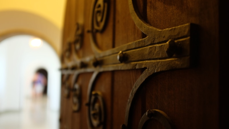 close-up, no people, building, wheel, handle, antique, in a row, furniture, closet, china cabinet, window, architecture, focus on foreground, private mailbox
