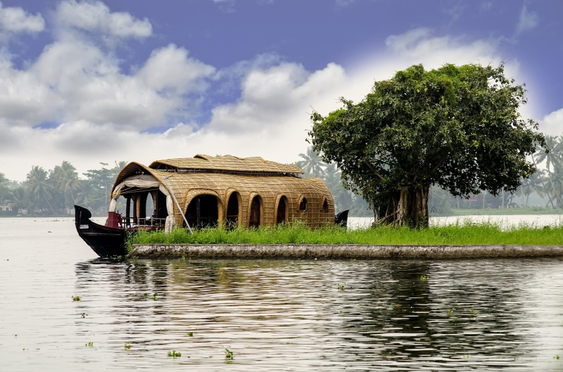 brown, waterfront, houseboat booking, architecture, docked, beauty in nature, kerala houseboat, tree, island, nature, boat, cloud - sky, built structure