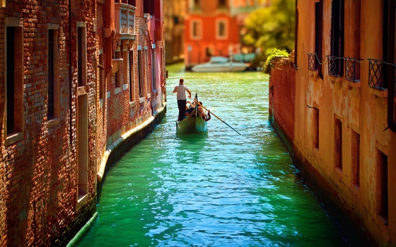 lifestyles, building exterior, gondolier, architecture, leisure activity, women, water, rowing, day, cityscape, gondola - traditional boat, travel, Venice