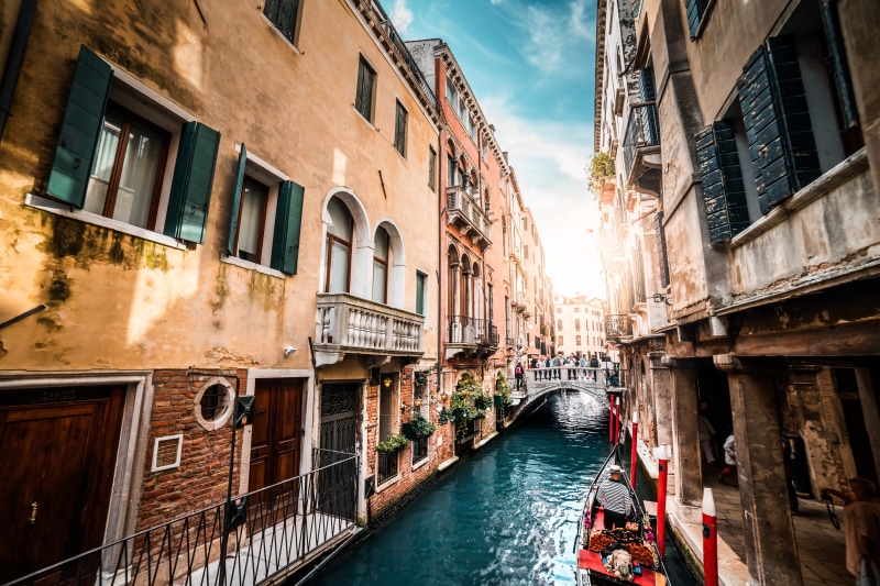 outdoors, sky, building, building exterior, traveling, passenger craft, gondola, city, window, water, travel destinations, street, architecture, venezia