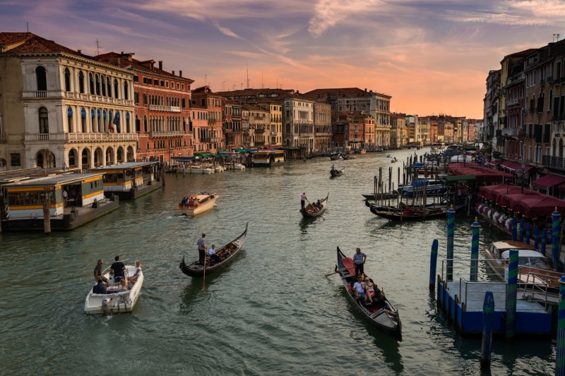 travel destinations, building exterior, nautical vessel, water, cloud - sky, nature, city, boat, architecture, gondola - traditional boat, mode of transportation