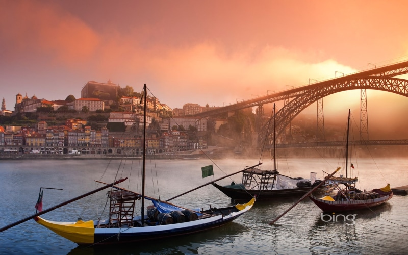 mode of transportation, outdoors, sky, nautical vessel, sunset, bridge - man made structure, dusk, gondola - traditional boat, cityscape, water, architecture