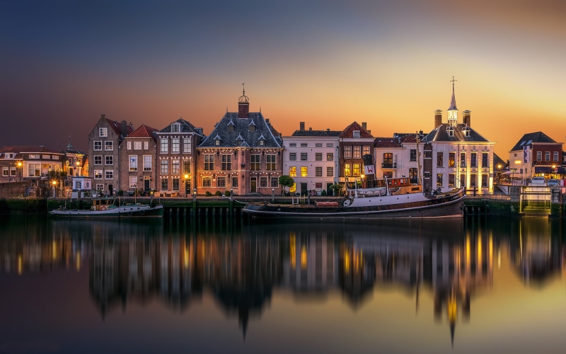 nature, building exterior, maassluis, built structure, river, building, row house, desktop, western, sky, transportation, mode of transportation, dusk