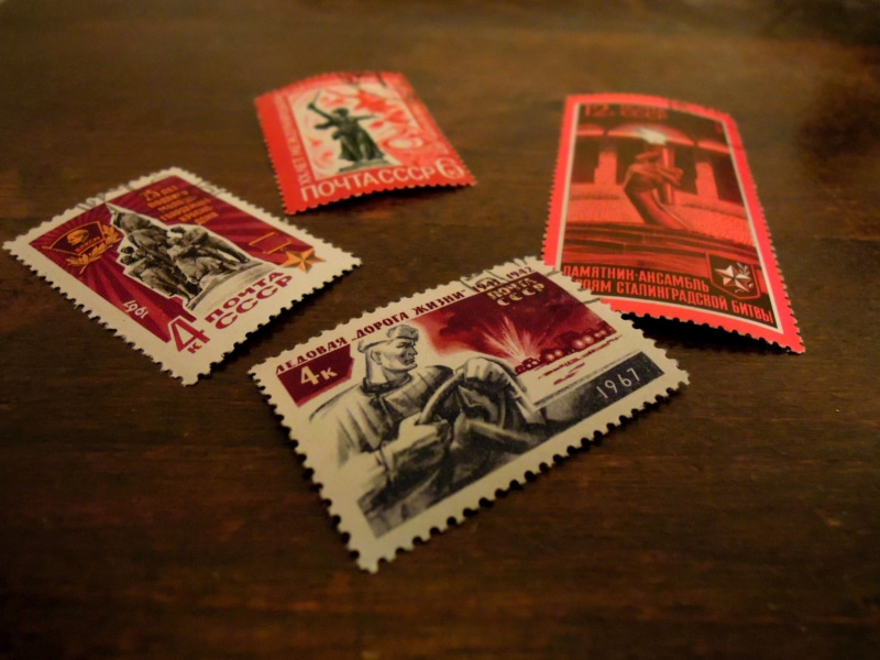 currency, old pictures, wood - material, no people, retro, past, communication, stamp, 1960, representation, indoors, high angle view, Character, luck