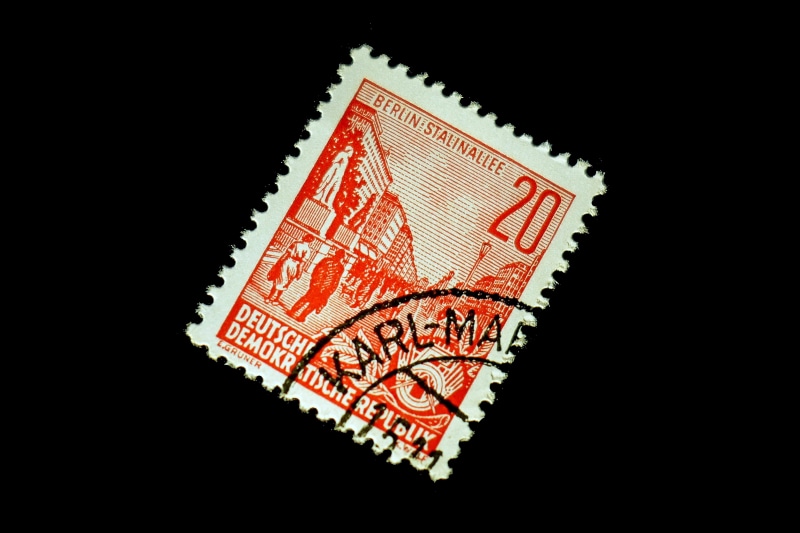 indoors, no people, studio shot, postage stamp, communication, letters, night, paper, old, black color, correspondence, single object, postage, industry