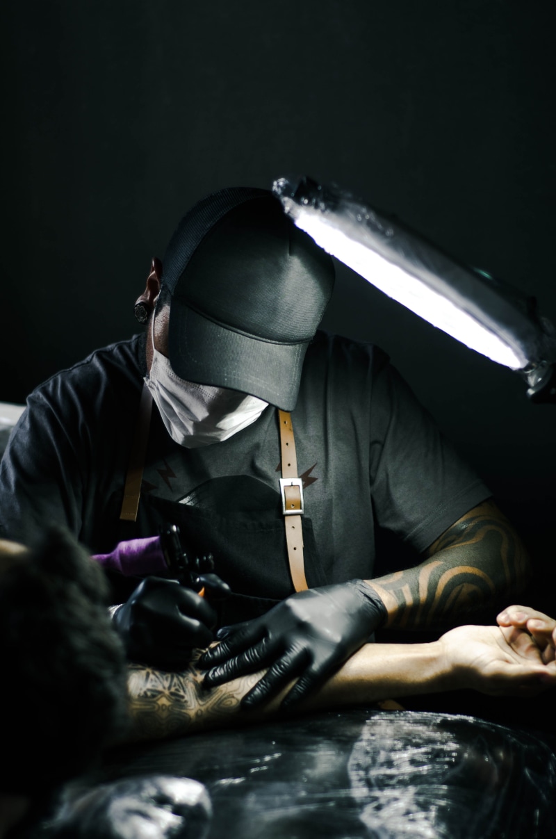 arm, three quarter length, men, tattoo, working, tattoo studio, work tool, gloves, portrait, process, holding, people, mask, artist, drawing, metal, metal industry