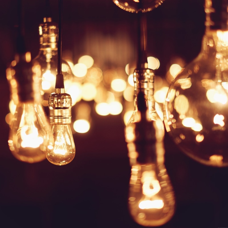 electric light, power supply, 720P, indoors, filament, focus on foreground, no people, bokeh, macro, hanging, glowing, light, glass, reflection, illuminated