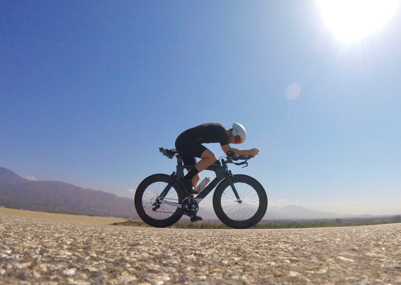 bicycle, sunny, sport, bike, full length, los angeles, transportation, blue, leisure activity, runner, sky, real people, lens flare, outdoors, lifestyles