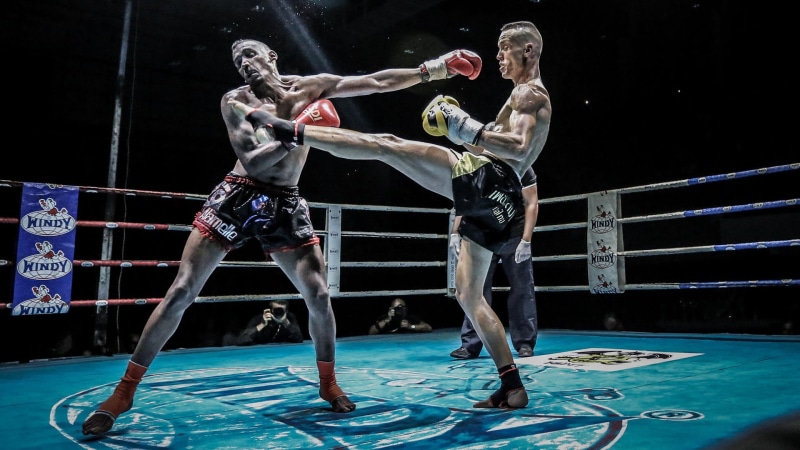 effort, full length, shorts, real people, 1080P, exercising, black background, kickboxing, athlete, adult, strength, s, sport, boxing - sport, boxing ring
