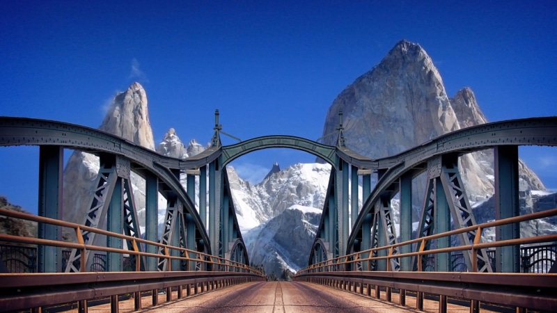 outdoors, connection, mountain, built structure, peak, argentina, transportation, direction, blue, the way forward, bridge, metal, sky, steel, iron - metal