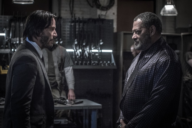John Wick: Chapter 2, standing, two people, business, Laurence Fishburne, facial hair, adult, John Wick, waist up, communication, young men, real people