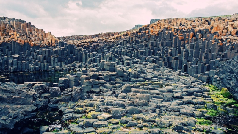 1080P, sky, scenics - nature, mountain, day, building exterior, built structure, no people, non-urban scene, Giants Causeway, stone wall, architecture