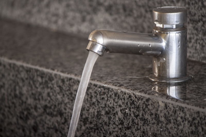 metal, outdoors, motion, nature, running, wash, close-up, hygiene, inserting, running water, focus on foreground, faucet, tap, stainless, shiny, silver