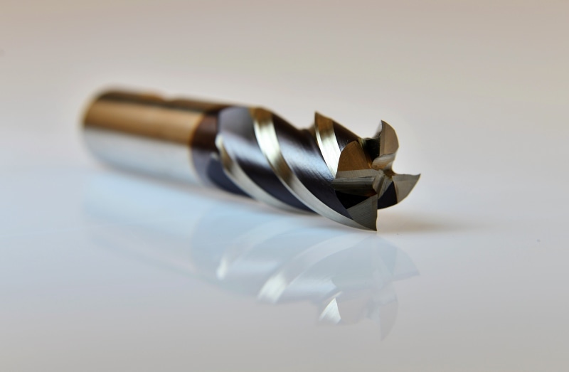 milling, milling tool, selective focus, still life, wealth, tool, luxury, aggression, steel, craft, end mill, emotion, table, cut, iron, chips, paper, high angle view