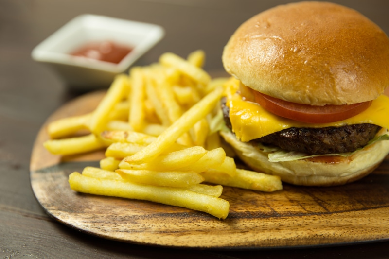 mustard, burger, take Out Food, fried, meat, onion, potato, sauce, table, cheese, snack, french Fries, food/Drink, fast Food French Fries, Cheeseburger