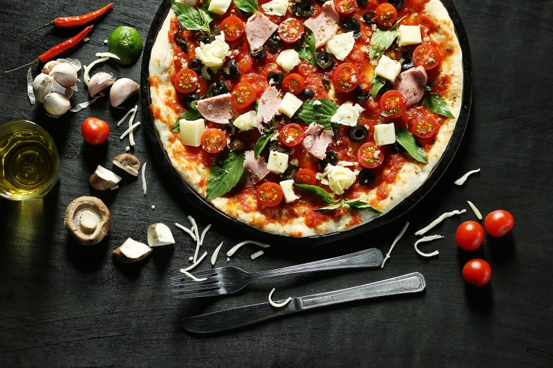 pizzas, make, pizza, tomato, indoors, cherry tomato, high angle view, table, food and Drink, freshness, household equipment, still life, vegetable, no people