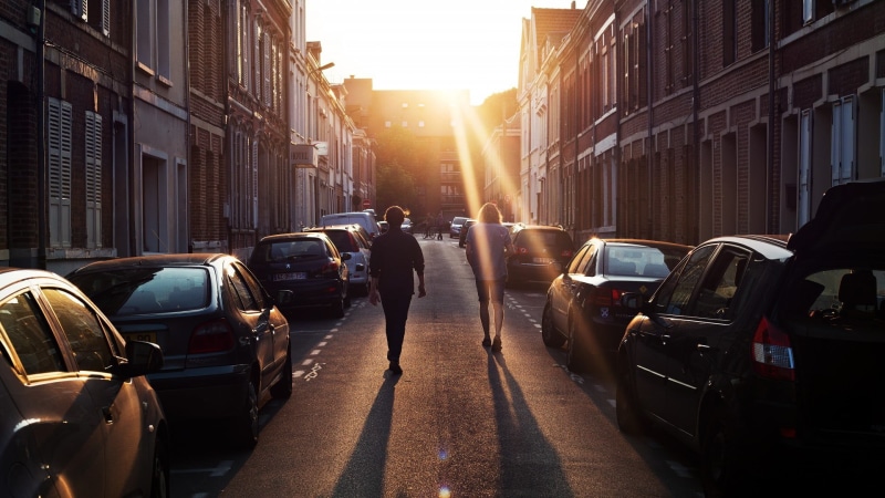 mode of transportation, lens flare, street, sunbeam, car, two, architecture, daytime, building, land vehicle, city street, city, city life, building exterior