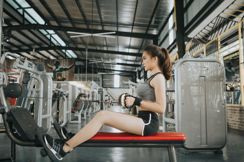 fitness model, sport, indoors, lifestyles, sneakers, side view, hairstyle, sitting, sports clothing, 1080P, full length, young adult, women, one person