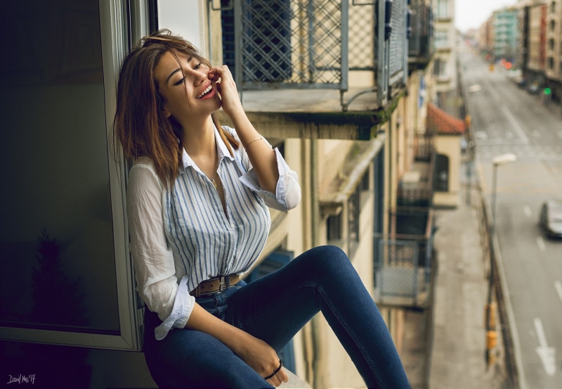 blue, 1080P, building exterior, lifestyles, smiling, street, woman, women, jeans, denim, hairstyle, architecture, auburn hair, dress, outdoors, shirt