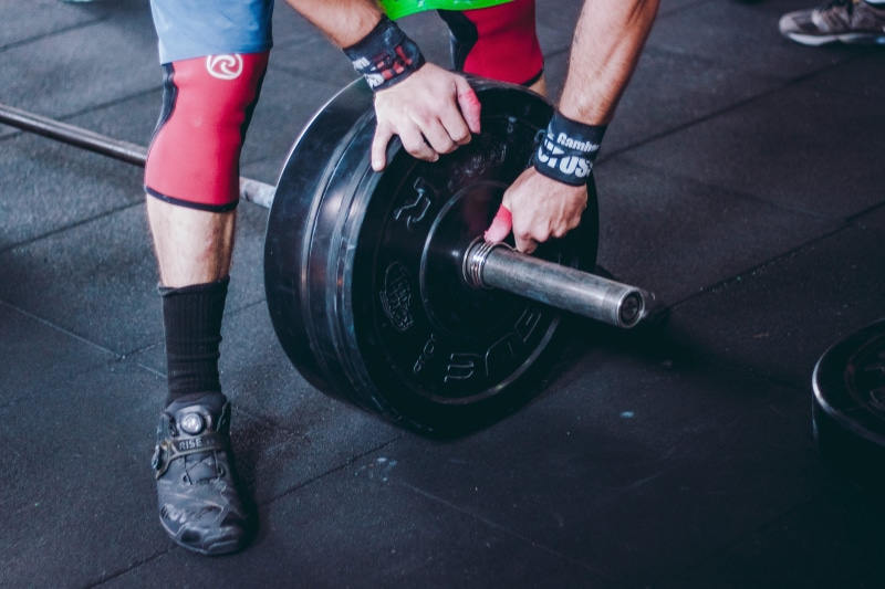 plate, footwear, weight, muscles, lifestyles, strength, man, brawny, sports equipment, exercising, bodybuilding, heavy, weight training, real people, body part