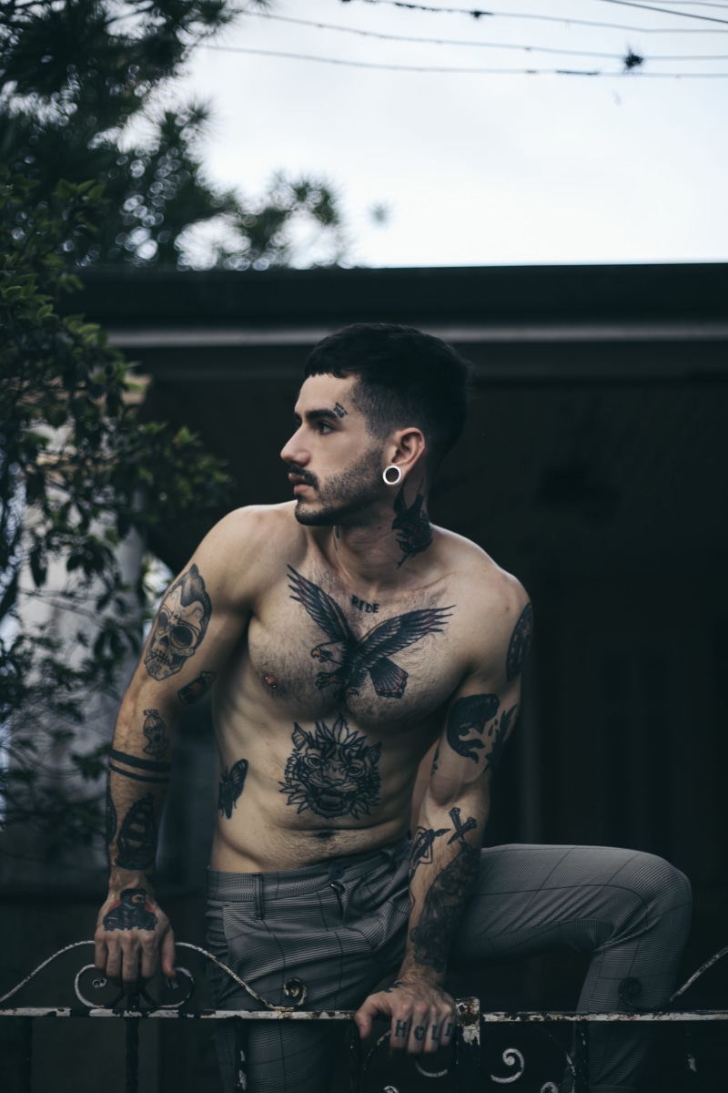 lifestyles, handsome, men, creativity, biceps, fence, fashion, looking, pose, three quarter length, abs, body, good-looking, guy, young adult, shirtless