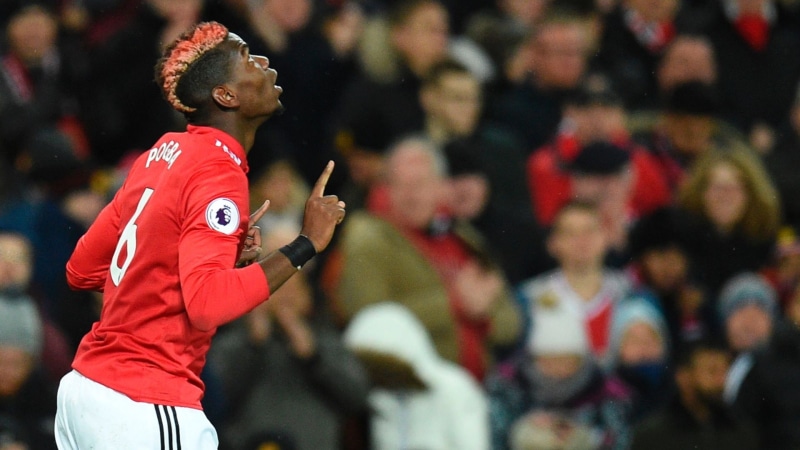 Paul Pogba, standing, sport, arts culture and entertainment, adult, crowd, focus on foreground, people, dancing, stage, celebration, performance, real people