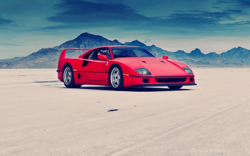 sky, transportation, arid climate, Ferrari, red, travel, no people, non-urban scene, cloud - sky, nature, scenics - nature, mountain, desert, mountain range