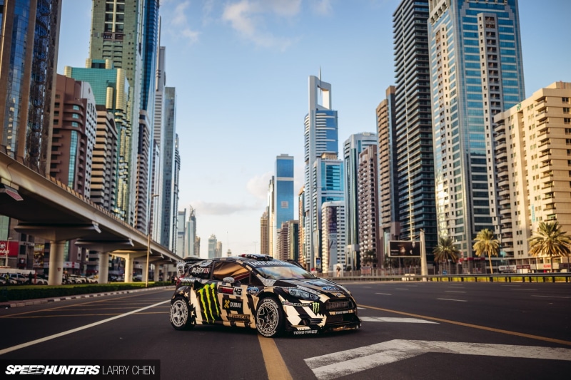 city life, skyscraper, 1080P, transportation, architecture, vehicle, city, outdoors, cityscape, road, black, building exterior, Monster Energy, Ken Block