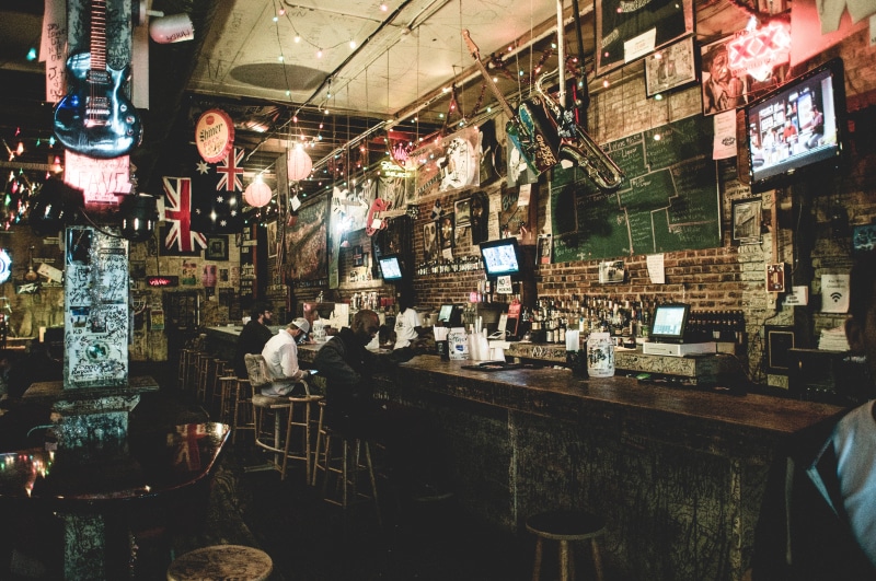 large group of objects, small business, 4K, choice, incidental people, nightlife, abundance, television, illuminated, variation, bartender, interior design