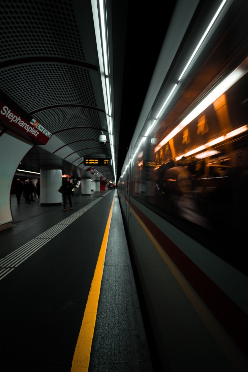 flare, human, sign, lighting, long exposure, highway, travel, person, ceiling, corridor, photo, train, asphalt, train - vehicle, built structure, railroad track
