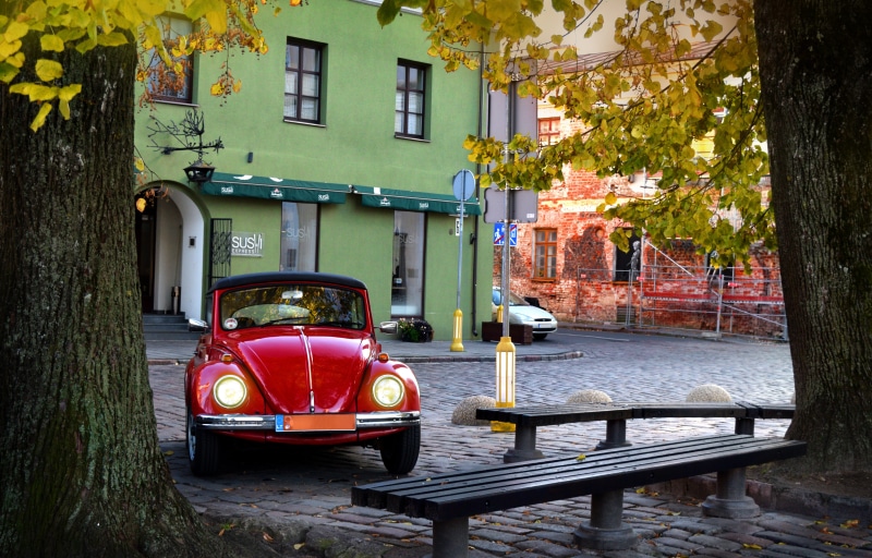 parked, retro, vehicle, bench, gray, automobile, auto, outdoors, old, red, vintage car, architecture, classic, building, trunk, mode of transportation