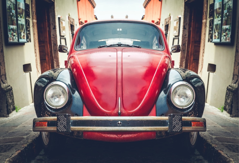 red, city, stationary, road, old, transportation, built structure, houses, land Vehicle, volkswagen, architecture, mode of transportation, building exterior