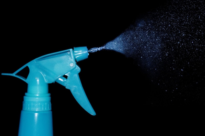 black background, supplies, dirty, sprinkle, wet, water, dark, close-up, fluid, background, medical, liquid, glass, no people, humid, bottle, gasoline