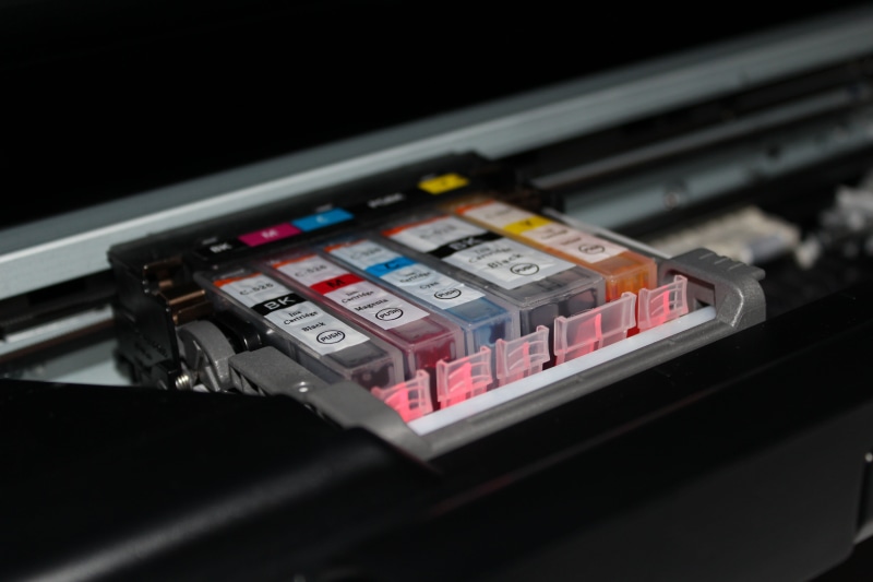 photography, single object, equipment, colors, communication, multi colored, indoors, electronics industry, 5K, machinery, cartridges, black background