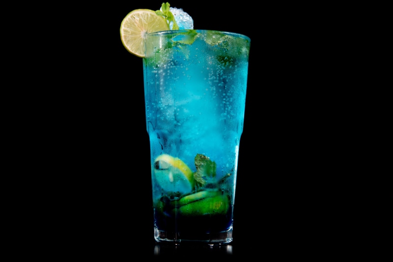 no people, beverage, blue, ice, lemonade, cocktail, pottery, refreshment, jar, fish, animal, mint, food and drink, citrus fruit, margarita, potted plant