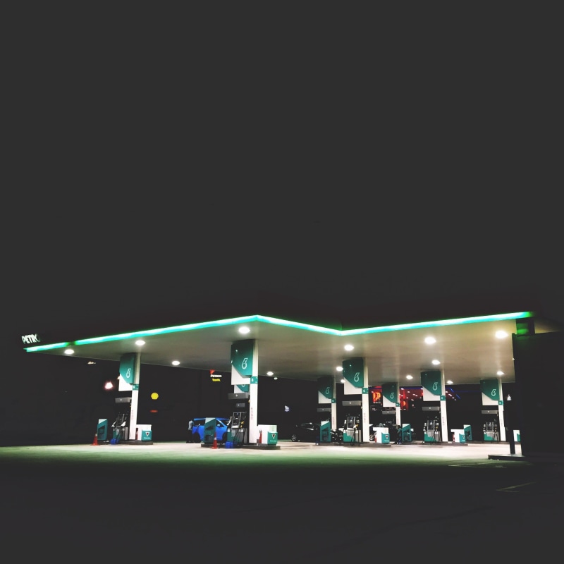 building exterior, gas, white, streetphotography, gas station, night working, group of people, real people, fuel and power generation, minimalism, city